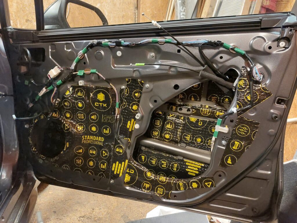 CTK butyl damping applied to the inner structure of a 2024 Toyota Corolla front door