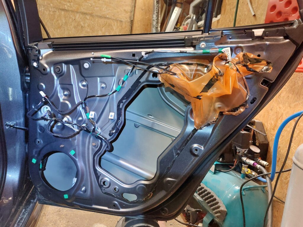 2024 Toyota Corolla rear door without factory sound deadening