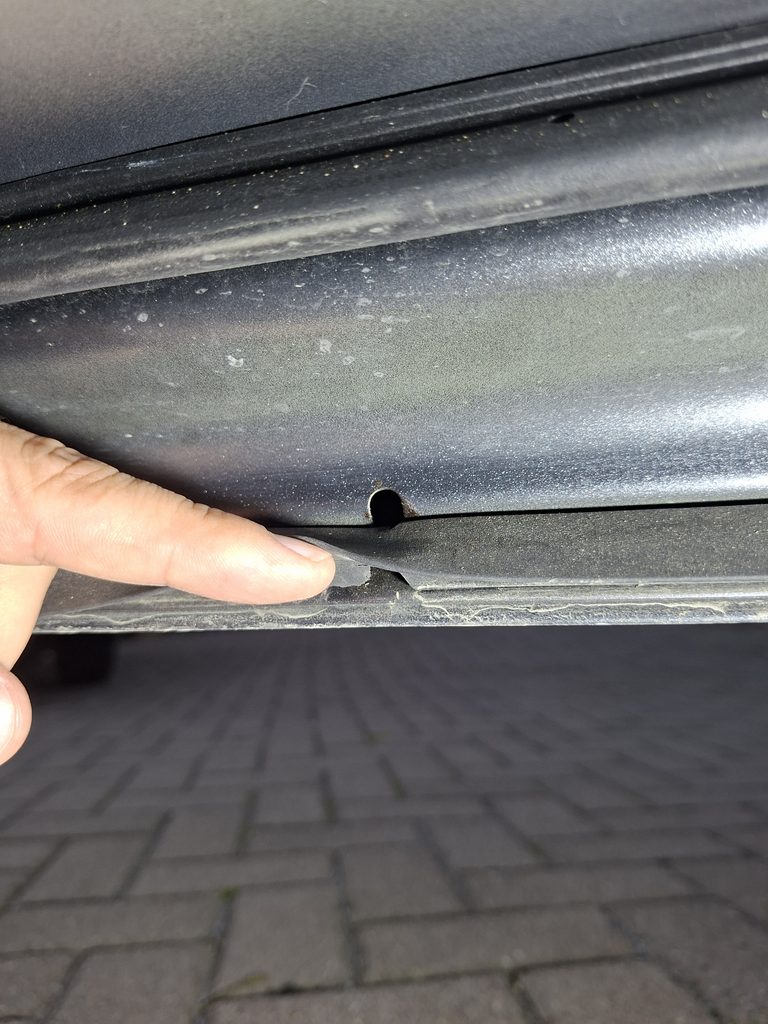 Toyota Corolla lower door seal cut around factory water drain hole