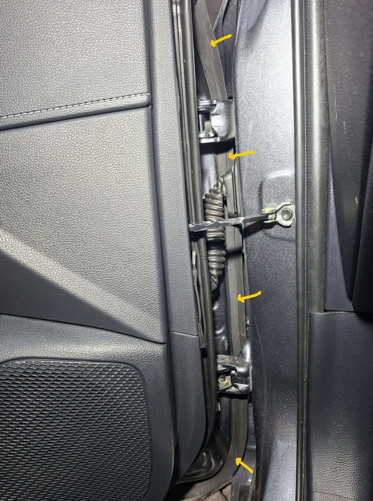Toyota Corolla additional door seal routing around front door hinge area